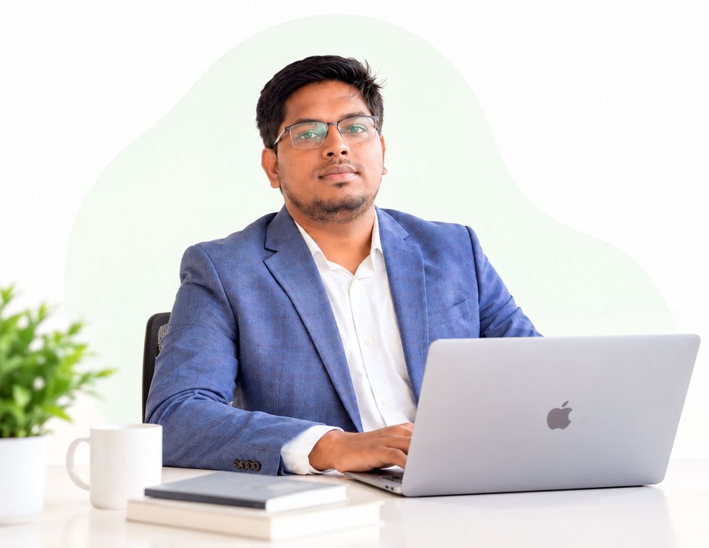 Rajibul Alam working on his laptop